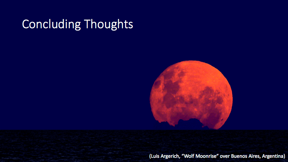 Red Moon rising over the ocean